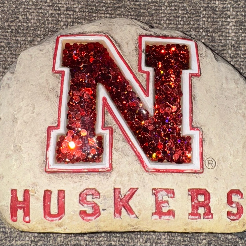 Huskers Decorative Stone with Red Glitter